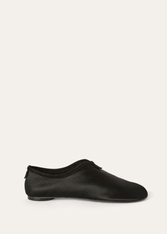 Zwevende platte loafer
