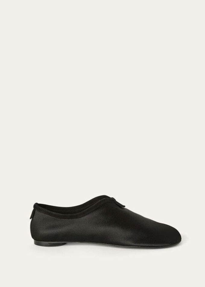 Zwevende platte loafer