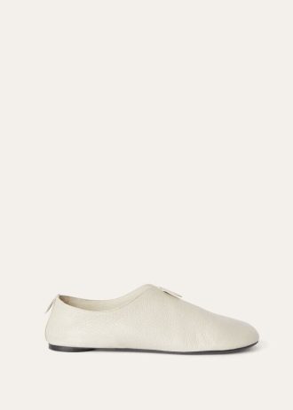 Zwevende platte loafer