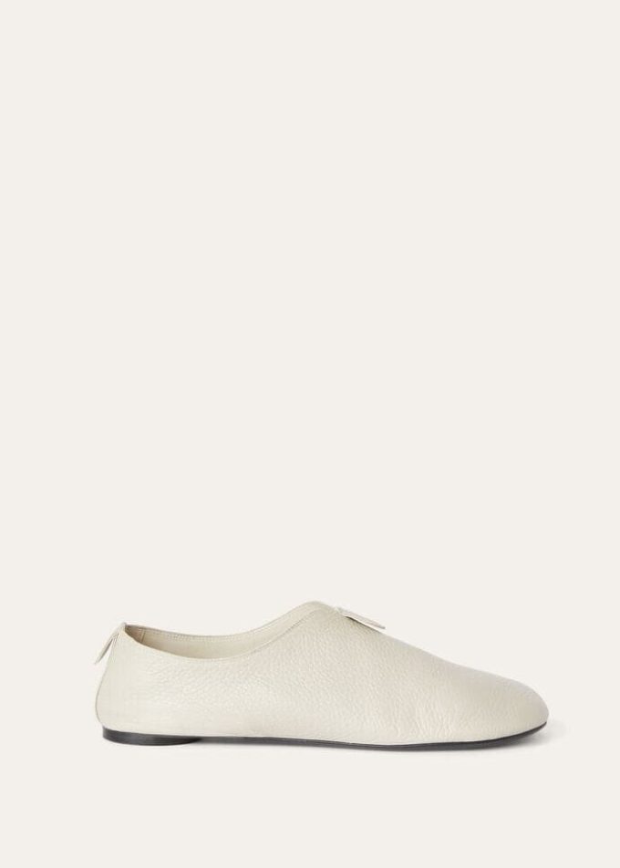 Zwevende platte loafer