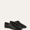 Zwevende platte loafer